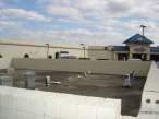 This grave yard is in the middle of the parking lot at a mall in Greenville, NC.jpg