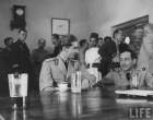 King Peter (C) chatting with a British R.A.F. officer in the Mess Hall.jpeg