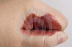 humor-photo-of-red-lipstick-drawn-onto-the-hand-and-fingers-rese-thumb1975580.jpg