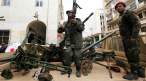 Gunmen prepared to fight against Libyan leader Moammar Gadhafi.jpg