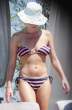 tn-Amanda_Holden_-_Bikini_candids_USA__Sept_2009_326.jpg