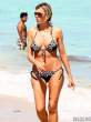 rita-rusic-black-bikini-tanning-miami-08-435x580.jpg