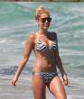 31757_Sylvie_van_der_Vaart_Bikini_Candids_on_the_Beach_in_St_Tropez_June_25_2012_06_122_161lo.jpg