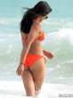 padma-lakshmi-in-an-orange-bikini-at-the-beach-02-435x580.jpg