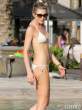 Abbey-Clancy-Relaxes-In-A-White-Bikini-At-The-Pool-In-Dubai-04-435x580.jpg