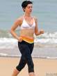 Anne-Hathaway-in-a-Bikini-Top-and-Yoga-Pants-in-Hawaii-08-435x580.jpg