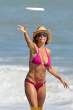 Lisa Rinna  sports a hot pink bikini while on the beach in Malibu. Aug 22, 2010 (7).jpg