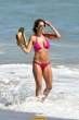 Lisa Rinna  sports a hot pink bikini while on the beach in Malibu. Aug 22, 2010 (12).jpg