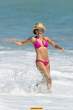 Lisa Rinna  sports a hot pink bikini while on the beach in Malibu. Aug 22, 2010 (17).jpg