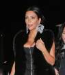Kim Kardashian Flaunts cleavage as she cosies up to Sam Smith at his concert January 29-2015 052.jpg