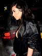 Kim-Kardashian-Deep-Shiny-Cleavage-In-Black-Heading-To-See-Kanye-At-SNL-40th-Anniversary-07-675x900.jpg